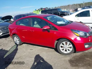 2014 Kia Rio EX z VIN KNADN4A35E6355797, wystawiony jako IAAI lot #41639623 z przebiegiem 152 057 mil mil oraz . Historia ofert i sprzedaży dostępna na DreamBid. Obrazek 13.