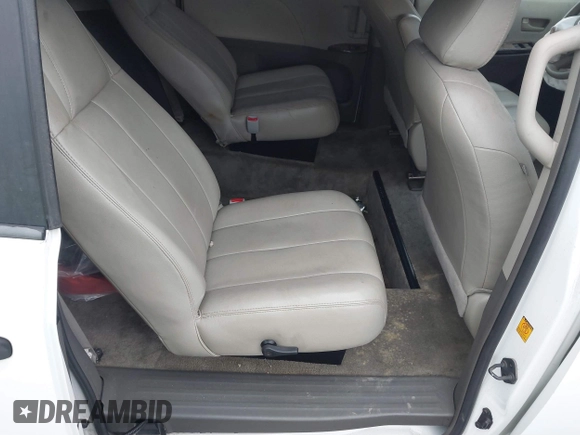 2012 Toyota Sienna with VIN 5TDZK3DCXCS271365, listed as a IAAI auction lot 38121628 with 101,756 mi miles and . Bid and sale history available at DreamBid. Image 8.