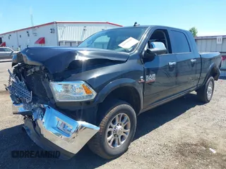 2018 Ram 2500 Laramie with VIN 3C6UR5NL9JG276737, listed as a IAAI auction lot 42378589 with 75,897 mi miles and . Bid and sale history available at DreamBid. Image 2.