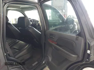 2009 Cadillac Escalade z VIN 1GYFK43569R108175, wystawiony jako IAAI lot #42131344 z przebiegiem 178 861 mil mil oraz . Historia ofert i sprzedaży dostępna na DreamBid. Obrazek 8.