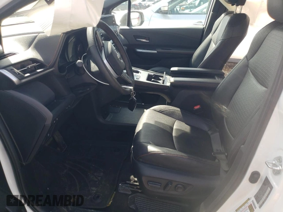 2023 Toyota Sienna XSE with VIN 5TDDSKFC1PS099900, listed as a Copart auction lot 52384175 with Not provided miles and Salvage title. Bid and sale history available at DreamBid. Image 7.