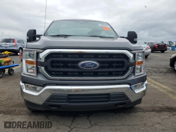 2021 Ford F-150 XL with VIN 1FTMF1E57MKD42212, listed as a Copart auction lot 61053984 with Not provided miles and Salvage title. Bid and sale history available at DreamBid. Image 5.