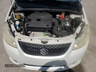 2009 Suzuki SX4 z VIN JS2YC416396200021, wystawiony jako Copart lot #56676075 z przebiegiem 150 981 mil mil oraz Szkoda całkowita • Salvage title. Historia ofert i sprzedaży dostępna na DreamBid. Obrazek 11.