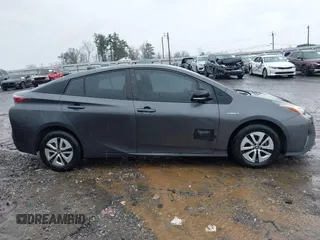 2017 Toyota Prius Two z VIN JTDKARFU9H3046747, wystawiony jako IAAI lot #41773391 z przebiegiem 148 728 mil mil oraz . Historia ofert i sprzedaży dostępna na DreamBid. Obrazek 13.