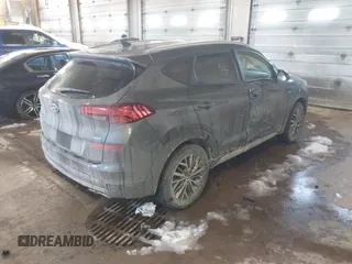 2019 Hyundai Tucson Ultimate with VIN KM8J3CAL0KU063161, listed as a IAAI auction lot 41606894 with 56,037 mi miles. Bid and sale history available at carsss.com. Image 4.