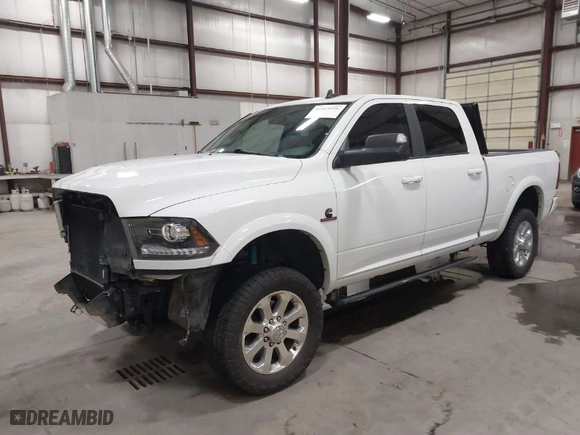 2018 Ram 2500 Laramie with VIN 3C6UR5FL1JG213467, listed as a IAAI auction lot 41513596 with 100,855 mi miles. Bid and sale history available at carsss.com. Image 2.