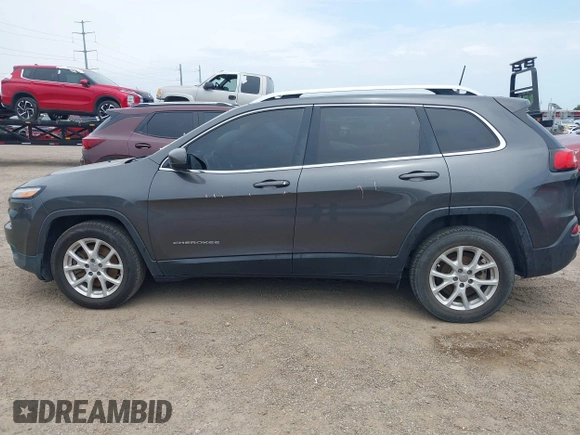 2017 Jeep Cherokee Latitude with VIN 1C4PJLCB1HW574447, listed as a IAAI auction lot 42395204 with 102,985 mi miles and . Bid and sale history available at DreamBid. Image 14.