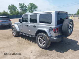 2019 Jeep Wrangler Unlimited Sahara with VIN 1C4HJXEN5KW542403, listed as a IAAI auction lot 42524989 with 60,451 mi miles and . Bid and sale history available at DreamBid. Image 3.