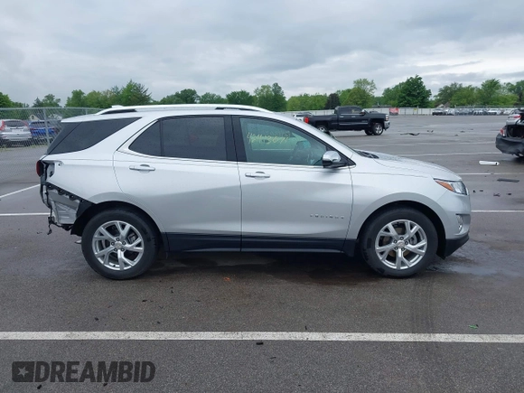 2021 Chevrolet Equinox Premier with VIN 3GNAXNEV4MS153066, listed as a IAAI auction lot 42413071 with 43,052 mi miles and . Bid and sale history available at DreamBid. Image 14.