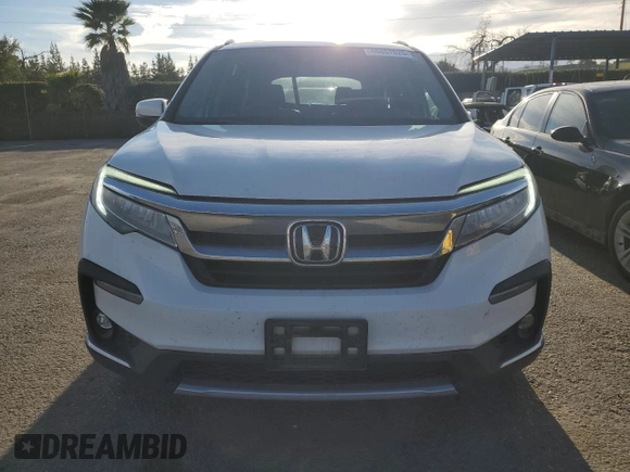 2020 Honda Pilot Touring 7-Passenger z VIN 5FNYF6H68LB002405, wystawiony jako Copart lot #46857625 z przebiegiem 69 617 mil mil oraz Szkoda całkowita • Salvage title. Historia ofert i sprzedaży dostępna na DreamBid. Obrazek 5.