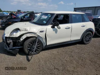 2016 MINI Hardtop 4 Door with VIN WMWXU1C53G2D12022, listed as a Copart auction lot 62108085 with 73,373 mi miles and Salvage title. Bid and sale history available at DreamBid. Image 1.