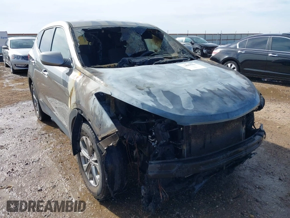2016 Hyundai Santa Fe z VIN 5XYZTDLB7GG326076, wystawiony jako IAAI lot #41435551 z przebiegiem Nie podano mil oraz . Historia ofert i sprzedaży dostępna na DreamBid. Obrazek 6.