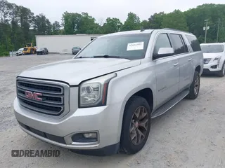 2015 GMC Yukon XL SLT with VIN 1GKS1HKC2FR251672, listed as a IAAI auction lot 42152312 with 232,736 mi miles and . Bid and sale history available at carsss.com. Image 2.