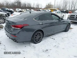 2019 Genesis G80 3.3T Sport with VIN KMHGN4JB5KU295935, listed as a IAAI auction lot 41481877 with 53,623 mi miles. Bid and sale history available at carsss.com. Image 4.