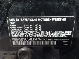 2014 BMW 5 Series 535i with VIN WBA5B1C54ED476763, listed as a IAAI auction lot 41590236 with 115,048 mi miles and . Bid and sale history available at DreamBid. Image 9.