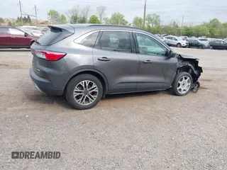2020 Ford Escape SEL with VIN 1FMCU0H68LUA61096, listed as a IAAI auction lot 42062185 with 60,972 mi miles and . Bid and sale history available at carsss.com. Image 4.
