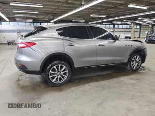 2017 Maserati Levante z VIN ZN661XUA2HX227999, wystawiony jako Copart lot #55331075 z przebiegiem 117 604 mil mil oraz Tytuł czysty. Historia ofert i sprzedaży dostępna na DreamBid. Obrazek 3.