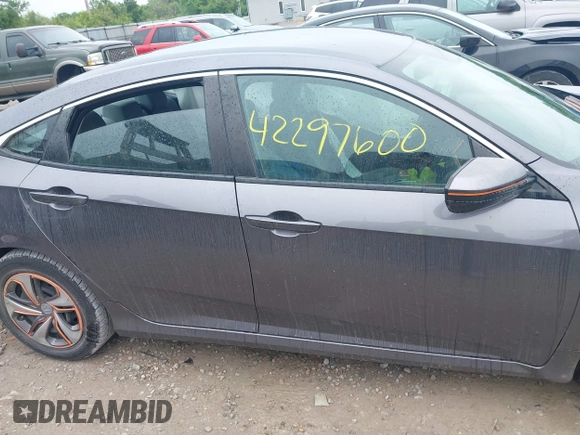 2020 Honda Civic LX z VIN 19XFC2F66LE012481, wystawiony jako IAAI lot #42297600 z przebiegiem 56 602 mil mil oraz . Historia ofert i sprzedaży dostępna na DreamBid. Obrazek 14.