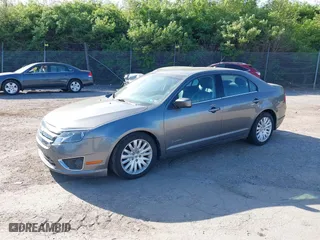 2011 Ford Fusion Hybrid with VIN 3FADP0L34BR290335, listed as a IAAI auction lot 42094674 with 171,391 mi miles. Bid and sale history available at carsss.com. Image 2.