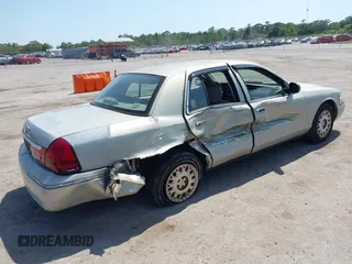2004 Mercury Grand Marquis GS with VIN 2MEFM74W14X632470, listed as a IAAI auction lot 42120233 with 292,357 mi miles and . Bid and sale history available at DreamBid. Image 4.