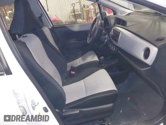 2013 Toyota Yaris L with VIN JTDKTUD33DD566664, listed as a IAAI auction lot 41524571 with 148,050 mi miles and . Bid and sale history available at DreamBid. Image 5.