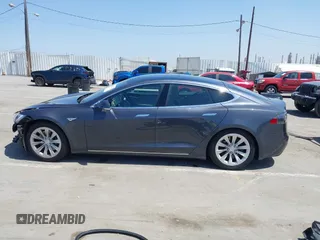 2016 Tesla Model S 90D with VIN 5YJSA1E22GF138236, listed as a IAAI auction lot 42532245 with 72,839 mi miles and . Bid and sale history available at DreamBid. Image 15.