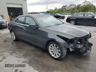 2015 Cadillac CTS Luxury AWD с VIN 1G6AX5SX1F0133045, выставлен на аукционе Copart как лот 46347325 с пробегом 32 437 миль миль и Списание • Salvage title. История ставок и продаж доступна на DreamBid. Изображение 4.