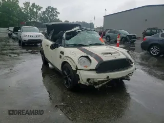 2014 MINI Convertible S с VIN WMWZP3C5XET706231, выставлен на аукционе Copart как лот 55610615 с пробегом 70 416 миль миль и Списание • Salvage title. История ставок и продаж доступна на DreamBid. Изображение 13.