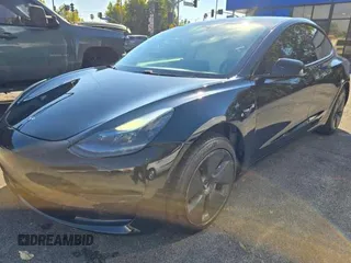 2021 Tesla Model 3 Standard Range Plus with VIN 5YJ3E1EA1MF871146, listed as a Copart auction lot 42027405 with 72,492 mi miles and Salvage Title. Bid and sale history available at DreamBid. Image 2.