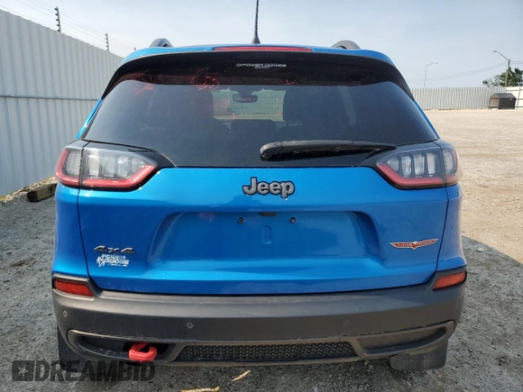 2019 Jeep Cherokee Trailhawk with VIN 1C4PJMBX7KD277477, listed as a Copart auction lot 58969705 with 139,521 mi miles and Salvage title. Bid and sale history available at DreamBid. Image 6.