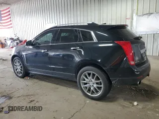 2014 Cadillac SRX Performance Collection with VIN 3GYFNFE34ES583362, listed as a Copart auction lot 61966535 with 145,954 mi miles and Non repairable. Bid and sale history available at DreamBid. Image 2.