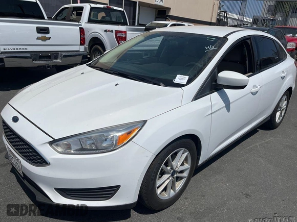 2018 Ford Focus SE z VIN 1FADP3F20JL259181, wystawiony jako IAAI lot #42400276 z przebiegiem 161 473 mil mil oraz . Historia ofert i sprzedaży dostępna na DreamBid. Obrazek 6.