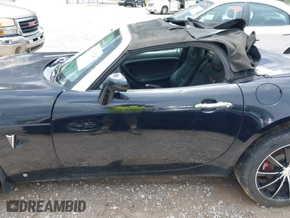 2007 Pontiac Solstice GXP z VIN 1G2MG35X17Y125299, wystawiony jako IAAI lot #42168624 z przebiegiem 123 526 mil mil oraz . Historia ofert i sprzedaży dostępna na DreamBid. Obrazek 14.