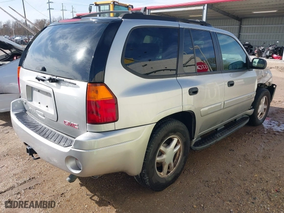 2005 GMC Envoy SLE with VIN 1GKDS13S252284455, listed as a IAAI auction lot 41455172 with 171,559 mi miles. Bid and sale history available at carsss.com. Image 4.