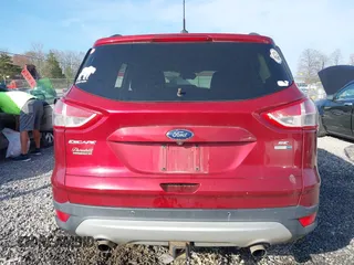 2014 Ford Escape SE with VIN 1FMCU9G90EUD71021, listed as a IAAI auction lot 42052487 with 154,811 mi miles and . Bid and sale history available at DreamBid. Image 17.