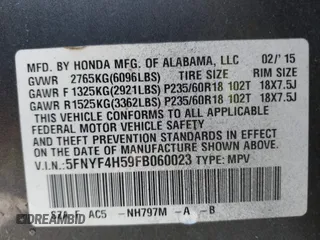 2015 Honda Pilot EX-L with VIN 5FNYF4H59FB060023, listed as a IAAI auction lot 41327793 with 197,981 mi miles and . Bid and sale history available at carsss.com. Image 9.