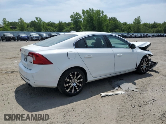 2017 Volvo S60 Inscription с VIN LYV402TKXHB147631, выставлен на аукционе Copart как лот 58393595 с пробегом 63 827 миль миль и Списание • Salvage title. История ставок и продаж доступна на DreamBid. Изображение 3.
