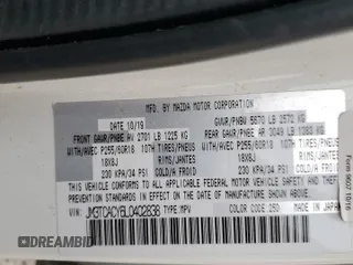 2020 Mazda CX-9 Touring with VIN JM3TCACY6L0402838, listed as a Copart auction lot 47088705 with Not provided miles and Salvage title. Bid and sale history available at DreamBid. Image 16.