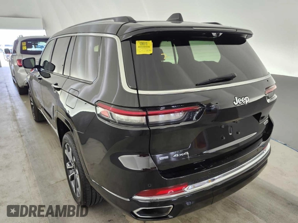 2021 Jeep Grand Cherokee Overland with VIN 1C4RJKDG7M8182214, listed as a IAAI auction lot 42796118 with 69,689 mi miles and . Bid and sale history available at DreamBid. Image 21.