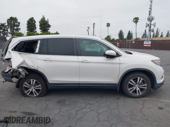 2016 Honda Pilot EX-L with VIN 5FNYF5H54GB037742, listed as a IAAI auction lot 41988112 with 68,459 mi miles and . Bid and sale history available at DreamBid. Image 13.