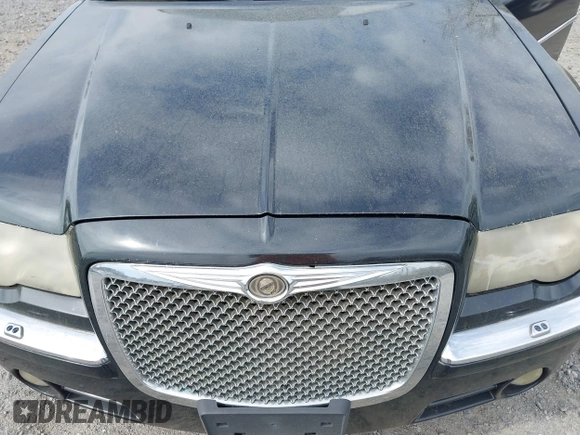 2006 Chrysler 300 C with VIN 2C3KA63H36H455735, listed as a IAAI auction lot 41875033 with 175,251 mi miles. Bid and sale history available at carsss.com. Image 10.