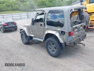 2004 Jeep Wrangler Sahara with VIN 1J4FA59S54P740417, listed as a IAAI auction lot 42382078 with 200,108 mi miles and . Bid and sale history available at DreamBid. Image 3.