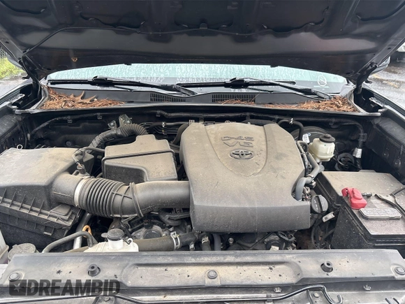 2021 Toyota Tacoma SR z VIN 5TFCZ5AN2MX279975, wystawiony jako IAAI lot #42477503 z przebiegiem 50 690 mil mil oraz . Historia ofert i sprzedaży dostępna na DreamBid. Obrazek 35.