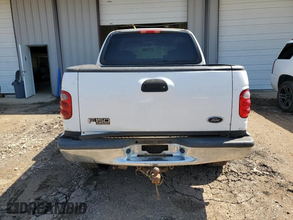 2003 Ford F-150 XLT with VIN 1FTRW08L23KD65857, listed as a Copart auction lot 71634004 with 321,505 mi miles and Clean Title. Bid and sale history available at carsss.com. Image 6.