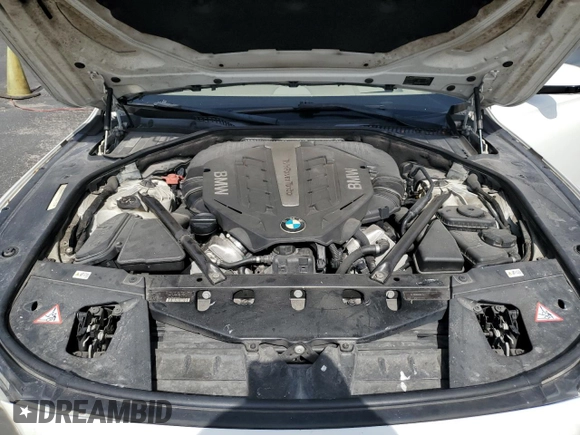 2012 BMW 7 Series 750Li z VIN WBAKB8C50CC964123, wystawiony jako Copart lot #60212005 z przebiegiem 75 979 mil mil oraz Szkoda całkowita • Salvage title. Historia ofert i sprzedaży dostępna na DreamBid. Obrazek 11.