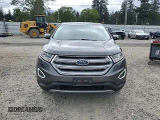 2015 Ford Edge Titanium z VIN 2FMTK4K84FBB09582, wystawiony jako Copart lot #55801915 z przebiegiem 72 533 mil mil oraz Szkoda całkowita • Salvage title. Historia ofert i sprzedaży dostępna na DreamBid. Obrazek 5.