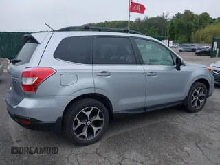 2014 Subaru Forester XT Touring with VIN JF2SJGMC1EH552474, listed as a IAAI auction lot 42461663 with 121,482 mi miles and . Bid and sale history available at DreamBid. Image 4.