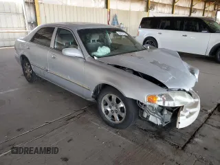 2002 Mazda 626 LX with VIN 1YVGF22C425273491, listed as a Copart auction lot 44626465 with 147,591 mi miles and Salvage Title. Bid and sale history available at carsss.com. Image 4.