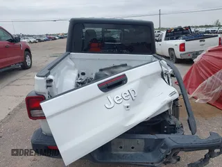 2023 Jeep Gladiator Overland z VIN 1C6HJTFG7PL566484, wystawiony jako IAAI lot #42424428 z przebiegiem 52 057 mil mil oraz . Historia ofert i sprzedaży dostępna na DreamBid. Obrazek 16.