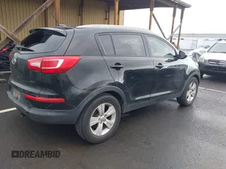 2011 Kia Sportage LX with VIN KNDPB3A26B7100916, listed as a IAAI auction lot 41939760 with 205,890 mi miles and . Bid and sale history available at carsss.com. Image 4.